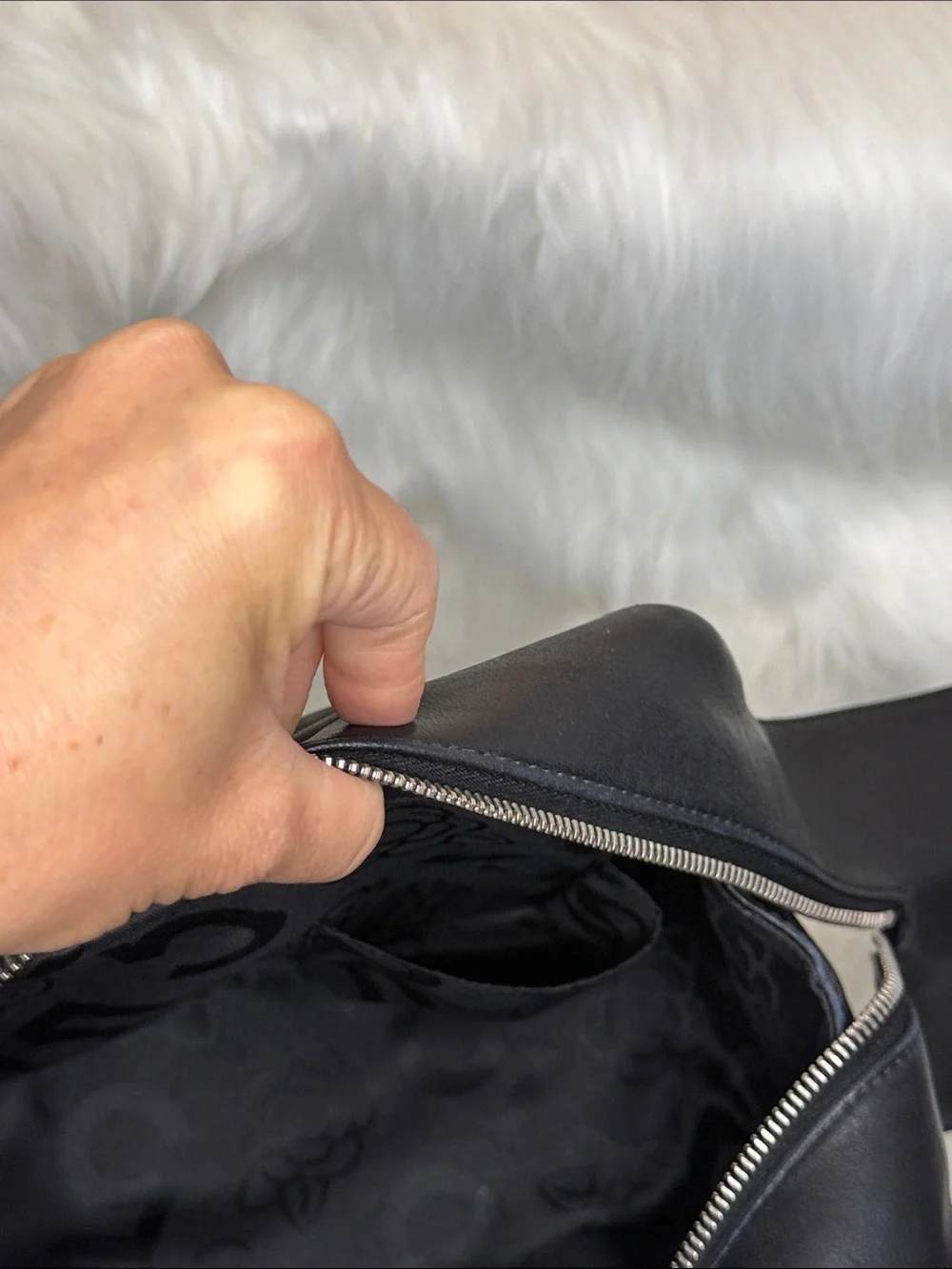CHANEL Black Quilted Leather Top-Handle Bag
